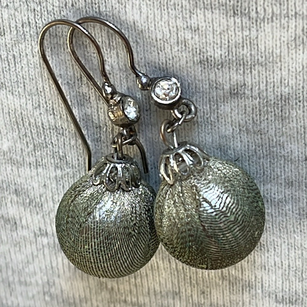 Silver tone earrings drop dangle mesh covered ball greenish hue ornament style